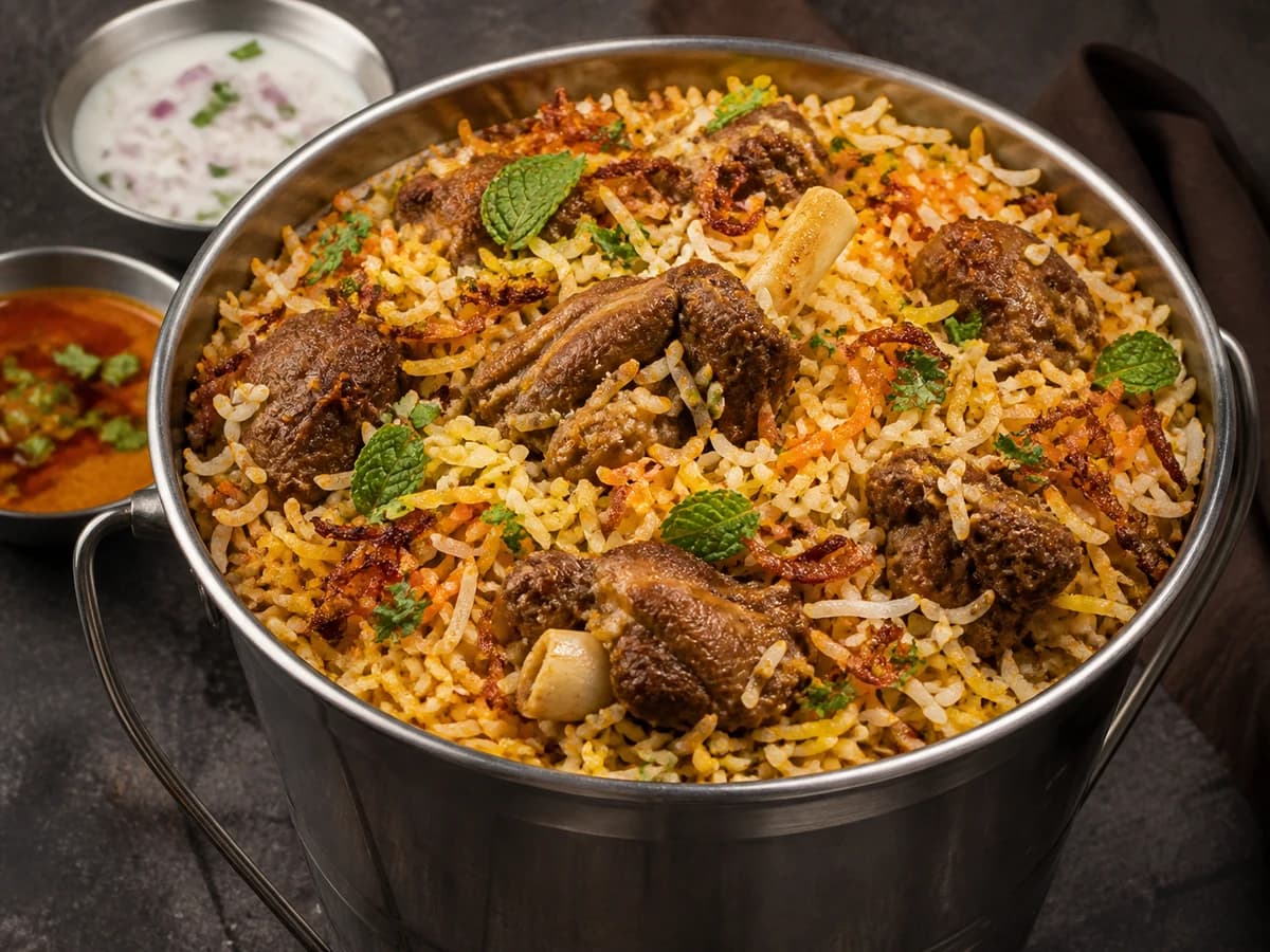 Mutton biryani styled food image for Mutton Bucket Biryani Combo – 1 kg