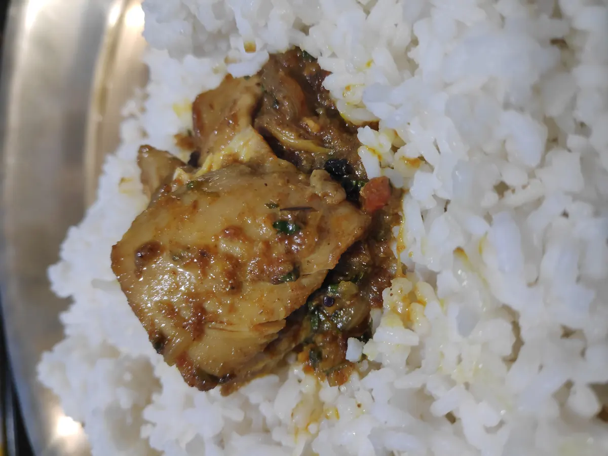 Chicken meal with rice and chicken curry