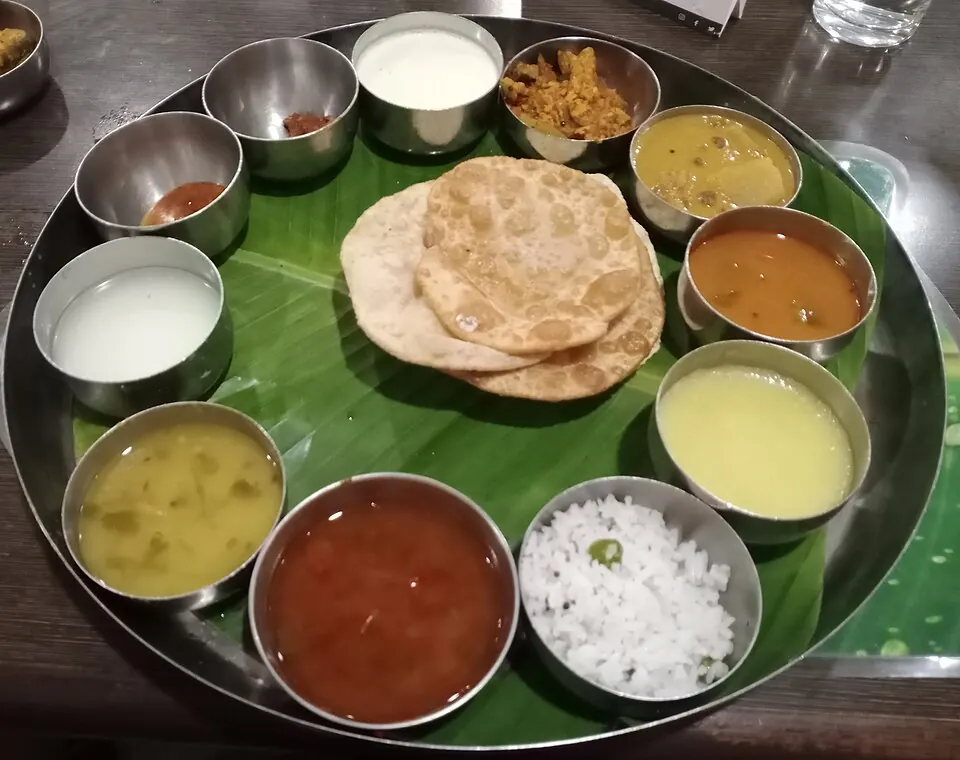 Premium South Indian vegetarian thali spread representing kitchen specials